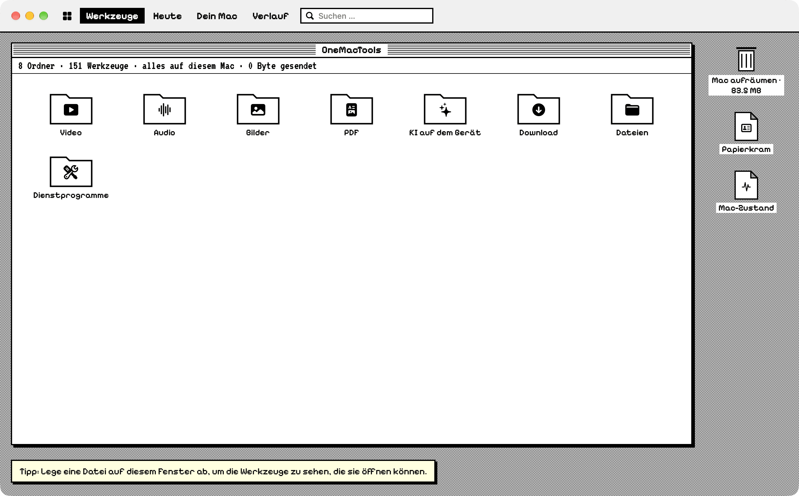 OneMacTools im Retro-Look: ein Schwarz-Weiß-Schreibtisch mit einem Fenster voller Kategorieordner