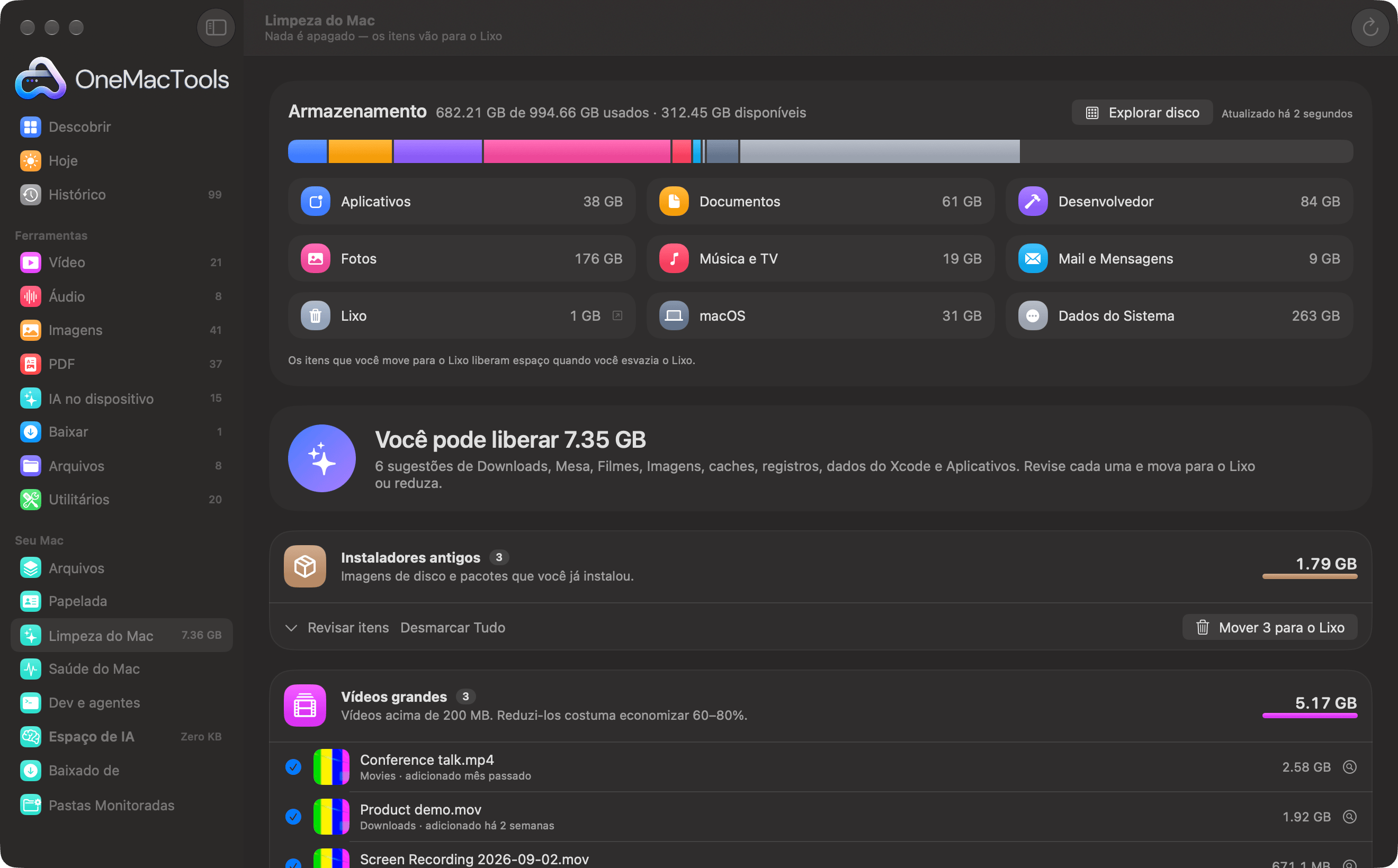Limpeza do Mac do OneMacTools listando instaladores antigos, vídeos grandes, capturas de tela antigas e duplicados, com Reduzir em vez disso e Mover para o Lixo